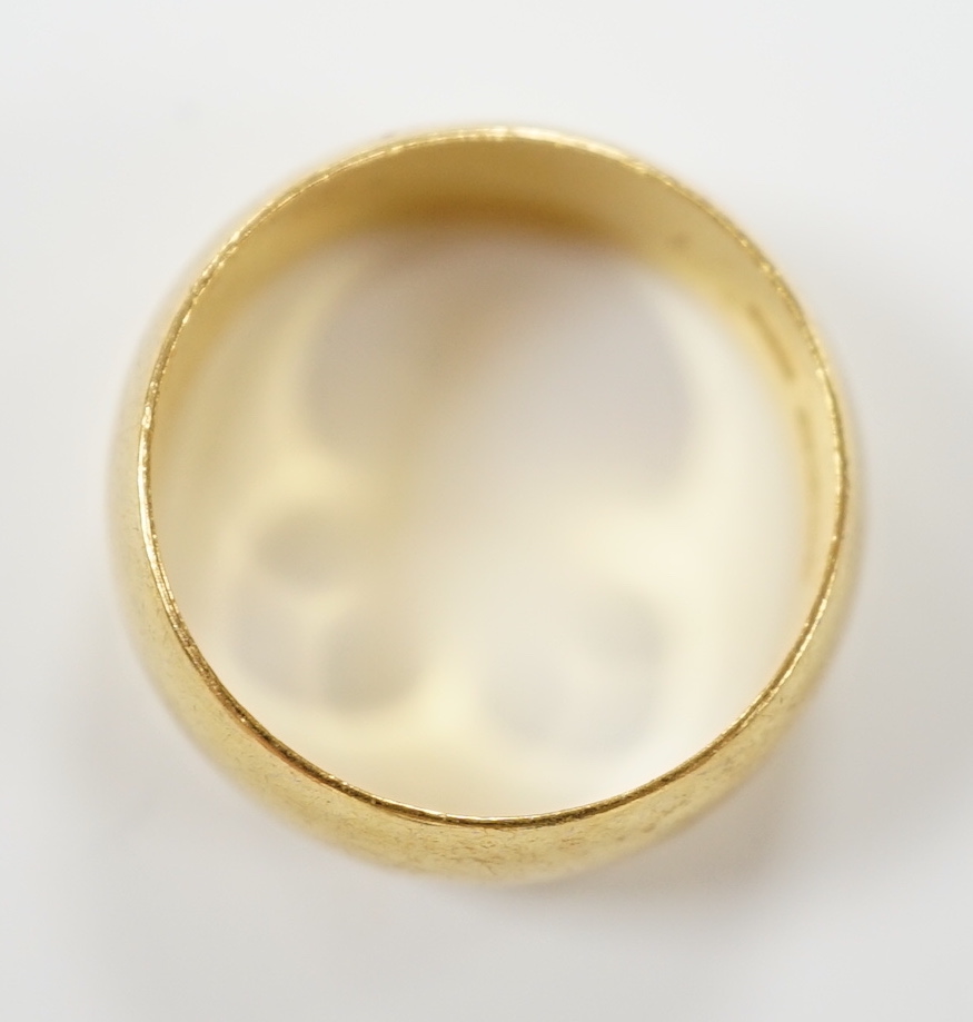 A 1960's 22ct gold wedding band, size L, 7.5 grams.